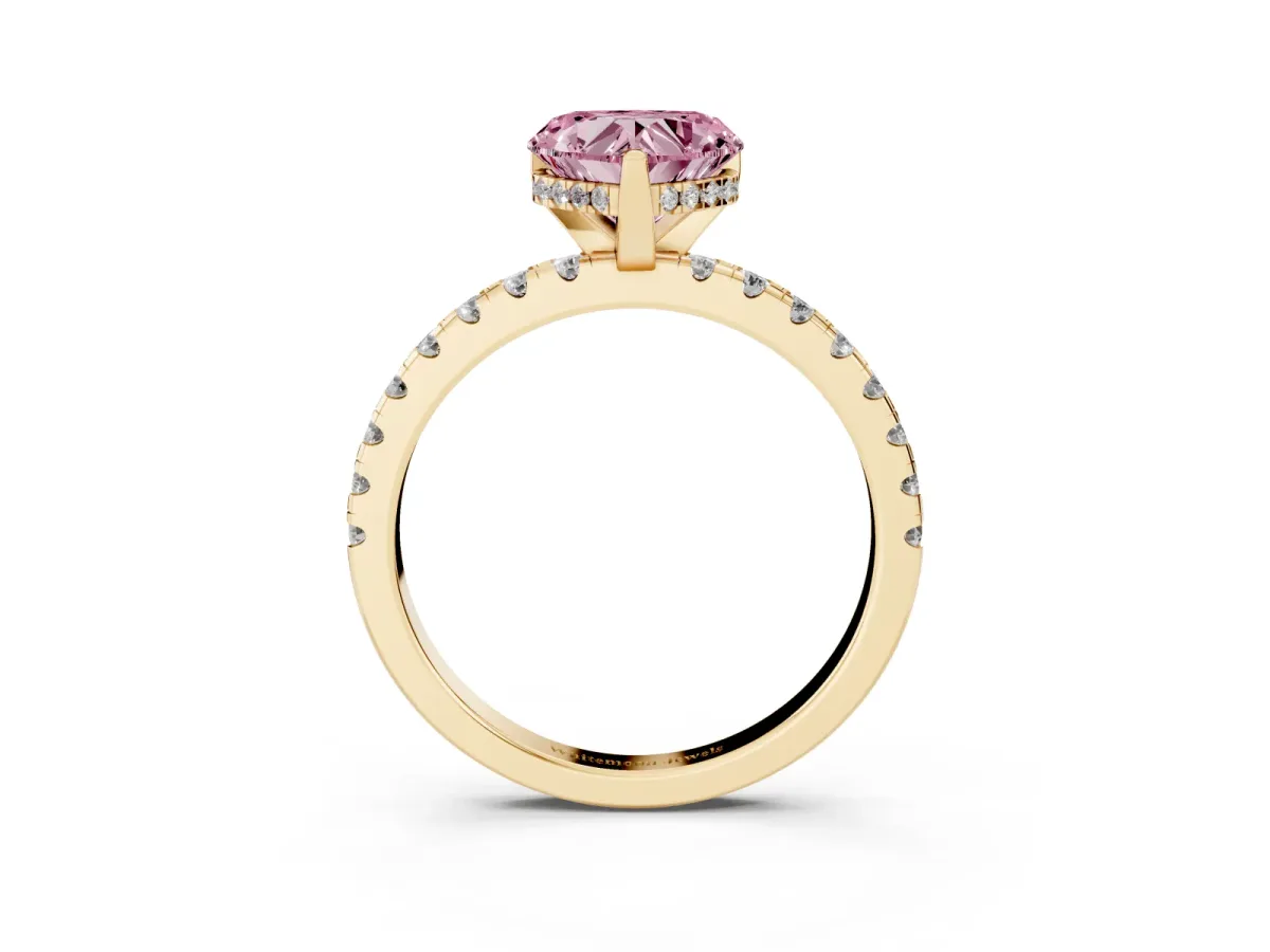 Fancy Pink Heart Cut Diamond Solitaire Ring with Round Pavé Band and Four-Prong Setting Yellow gold