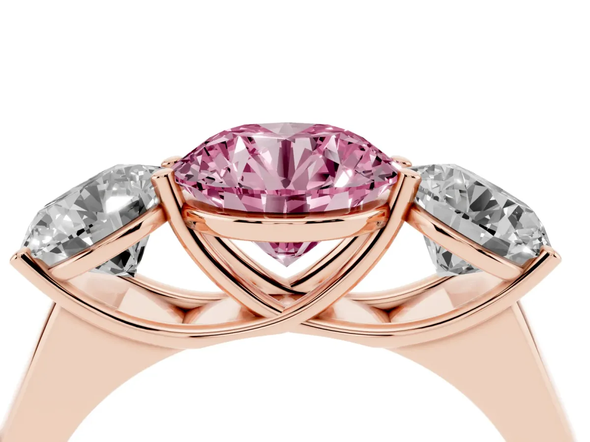 Fancy Pink Round Cut Three-Stone Diamond Ring with Prong Setting on a Classic Band Rose gold