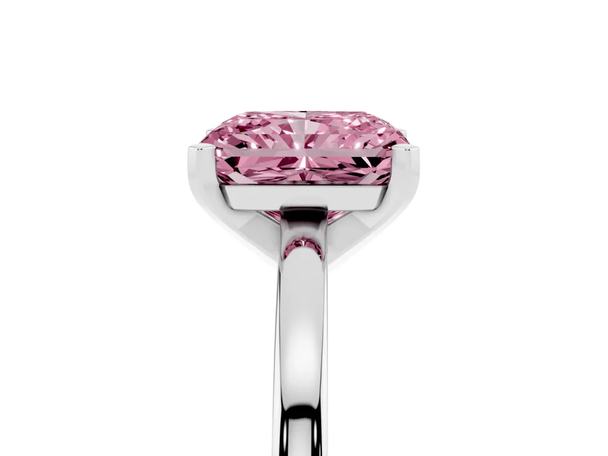 Fancy Pink Radiant Cut Solitaire Diamond Engagement Ring with Four-Prong Setting on a Classic Band Silver