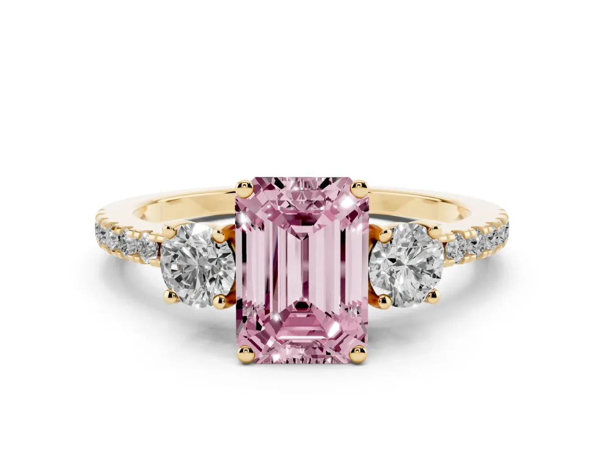 Fancy Pink Three-Stone Emerald Cut Cut Diamond Pavé Band with Prong Setting Yellow gold