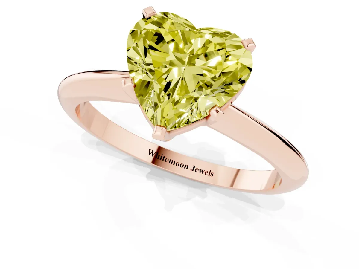 Fancy Yellow Heart Cut Cut Solitaire Ring with Four-Prong Setting on a Classic Band Rose gold