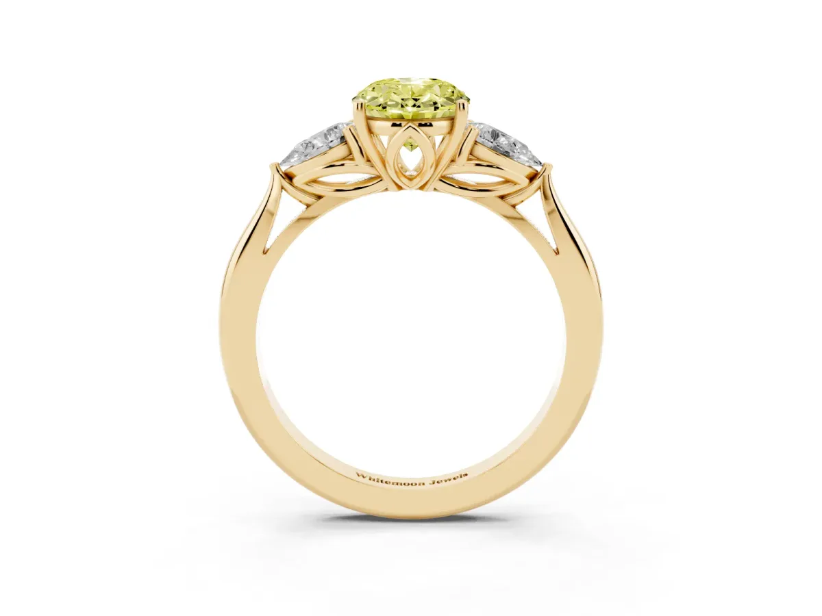 Fancy Yellow Oval Cut Diamond Three-Stone Ring with Pear Side Stones and Prong Setting Yellow gold