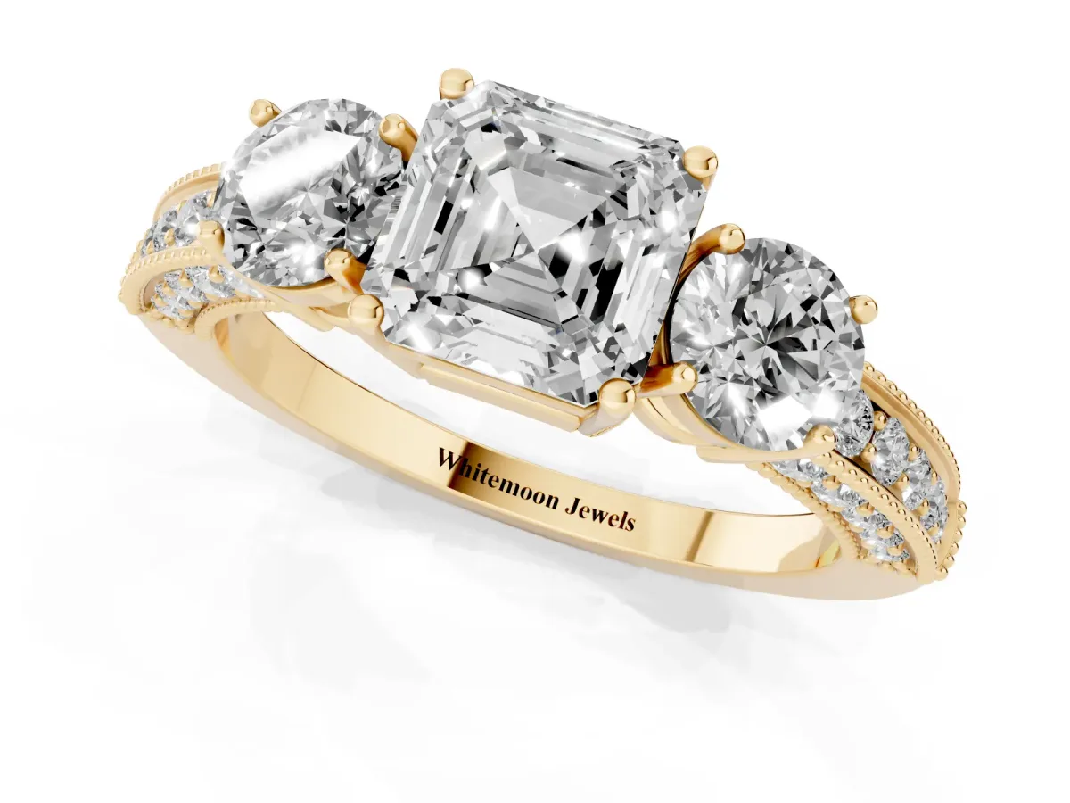 Asscher Cut Three-Stone Diamond Ring with Pavé Band and Four-Prong Setting Yellow gold