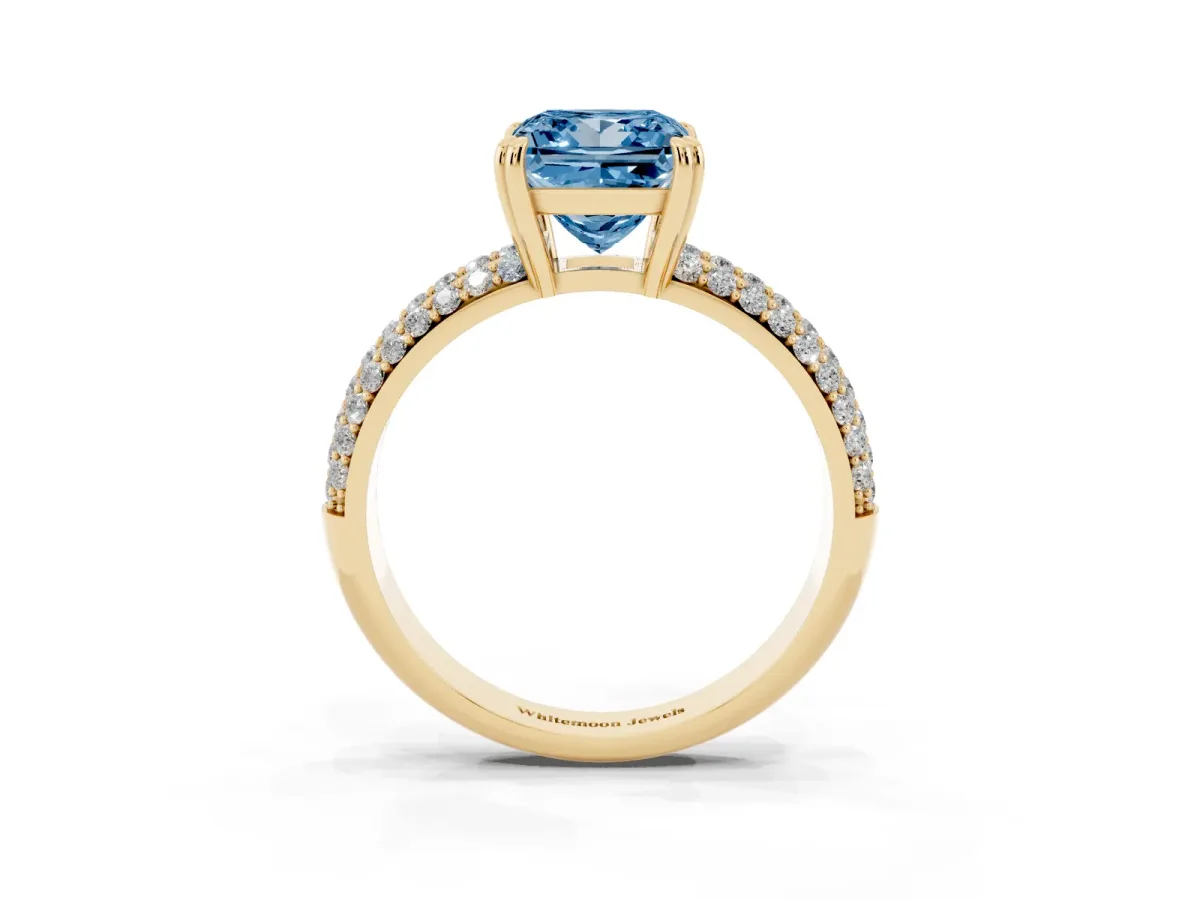 Fancy Blue Princess Cut Diamond Solitaire Ring with Multi-Row Round Pavé Band and Prong Setting Yellow gold