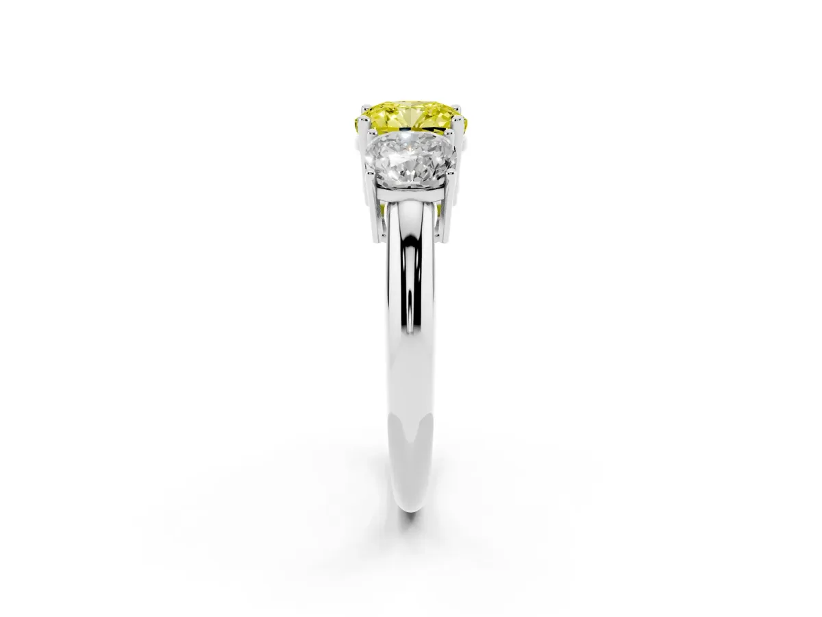 Fancy Yellow Three-Stone Cushion Cut Cut Diamond Engagement Ring with Prong Setting on a White Gold Band White gold