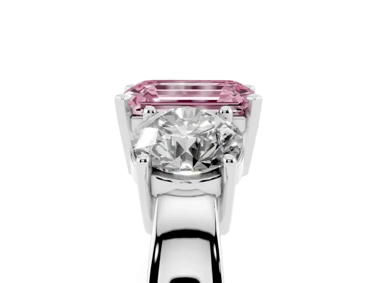 Fancy Pink Three-Stone Emerald Cut Diamond Ring with Round Side Stones, Classic Band, and Four-Prong Setting Silver