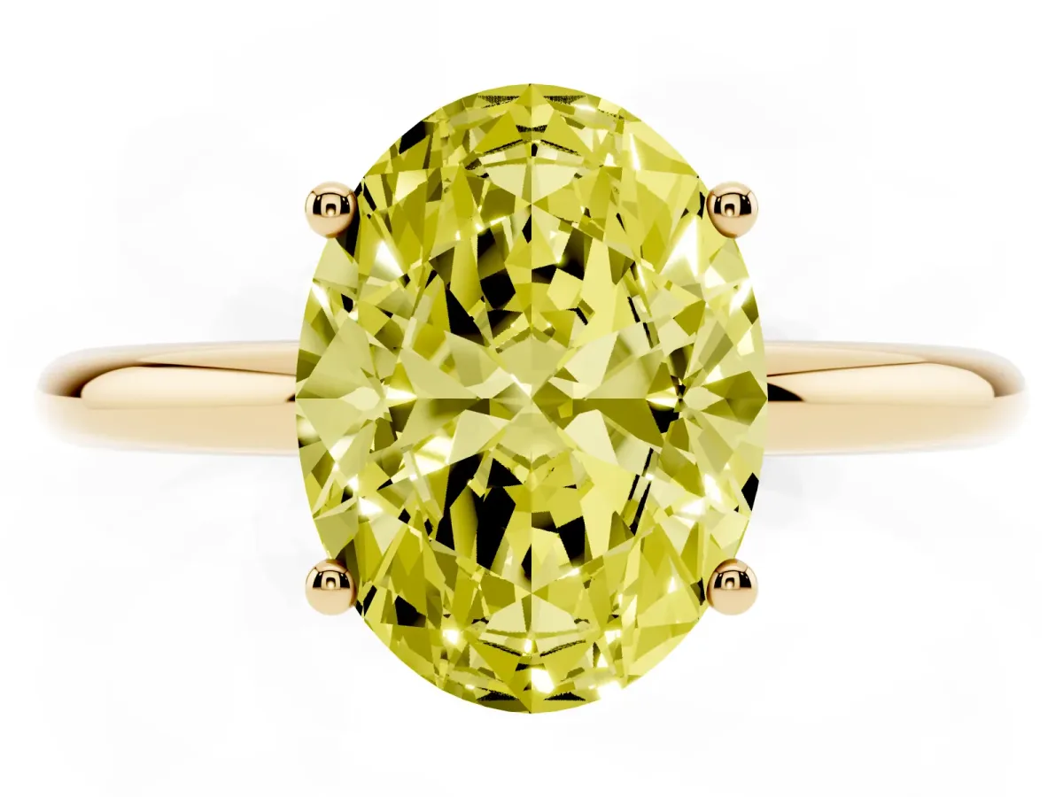 Fancy Yellow Oval Cut Cut Solitaire Engagement Ring with Four-Prong Setting and Classic Band Yellow gold