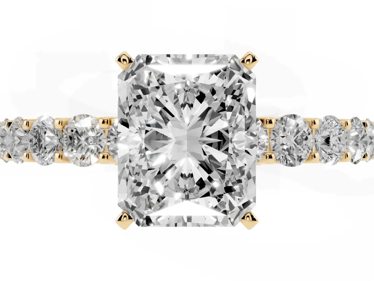 Radiant Cut Diamond Solitaire Ring with Shared Prong Pavé Band and Four-Prong Setting Yellow gold