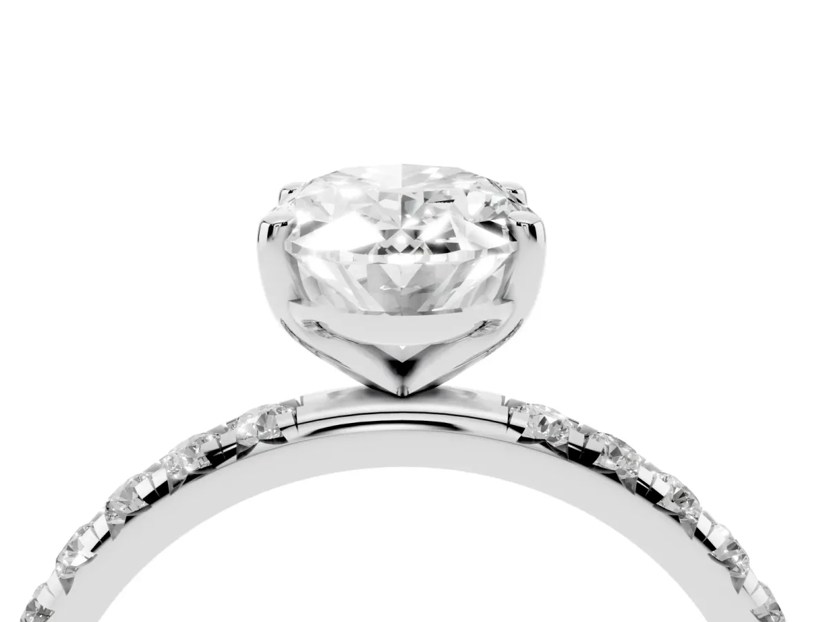 Oval Cut Cut Diamond Solitaire Ring with Micro Pave Band and Four Prong Setting White gold