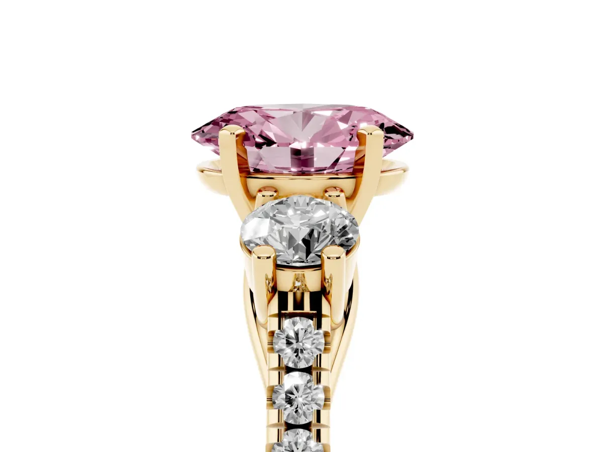 Fancy Pink Three-Stone Oval Cut Diamond Pavé Band with Four-Prong Setting Yellow gold