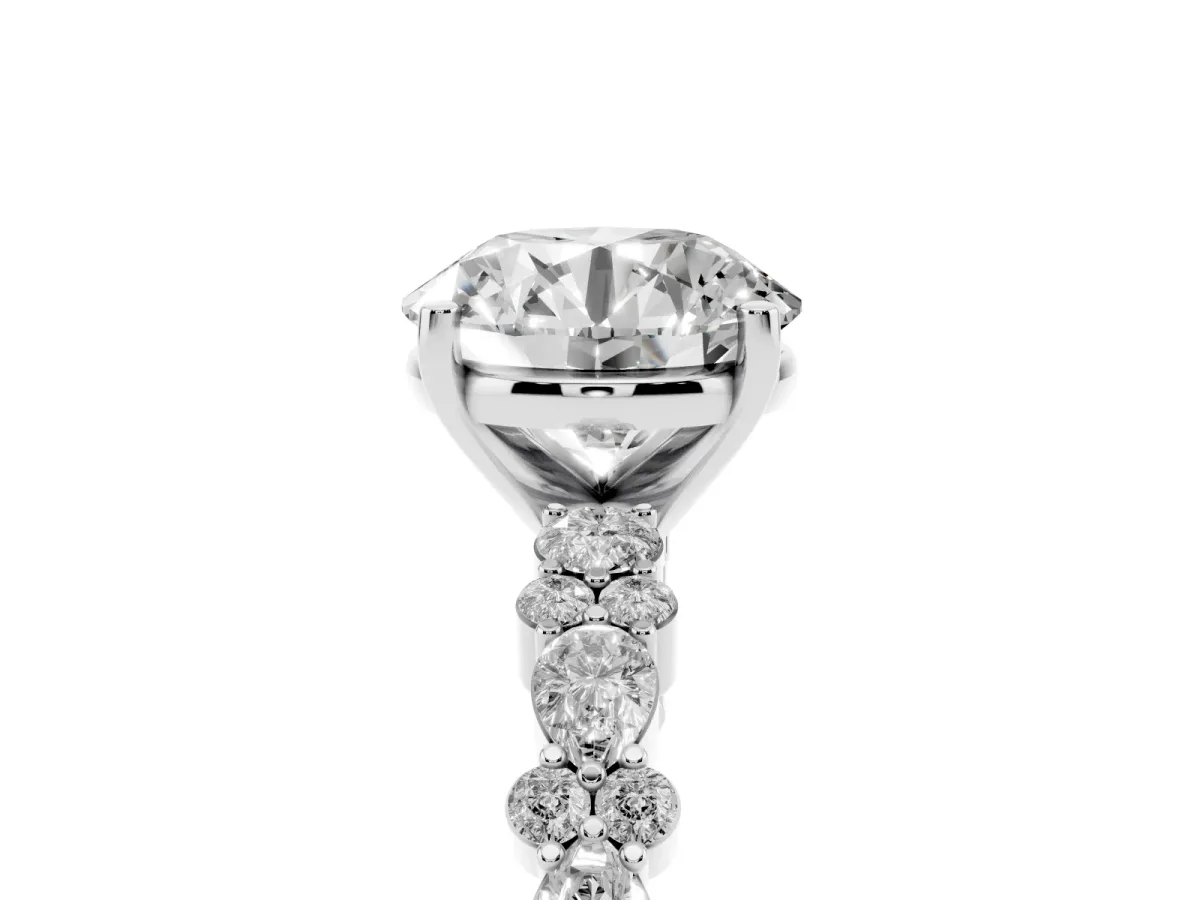 Round Cut Diamond Side Stone Solitaire Ring with Round and Four-Prong Setting Silver