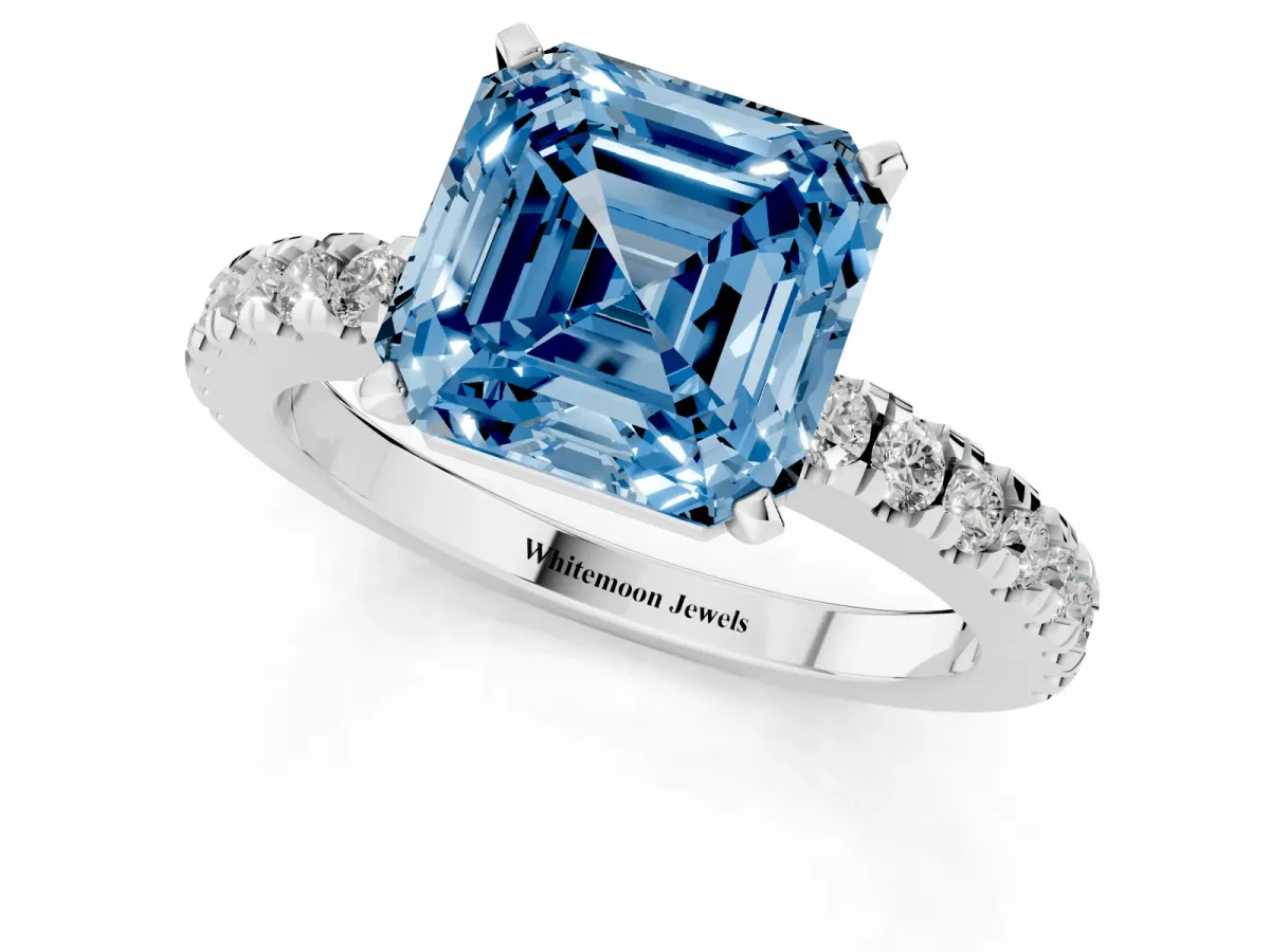 Fancy Blue Asscher Cut Solitaire Diamond with Pavé Band and Four-Prong Setting Silver