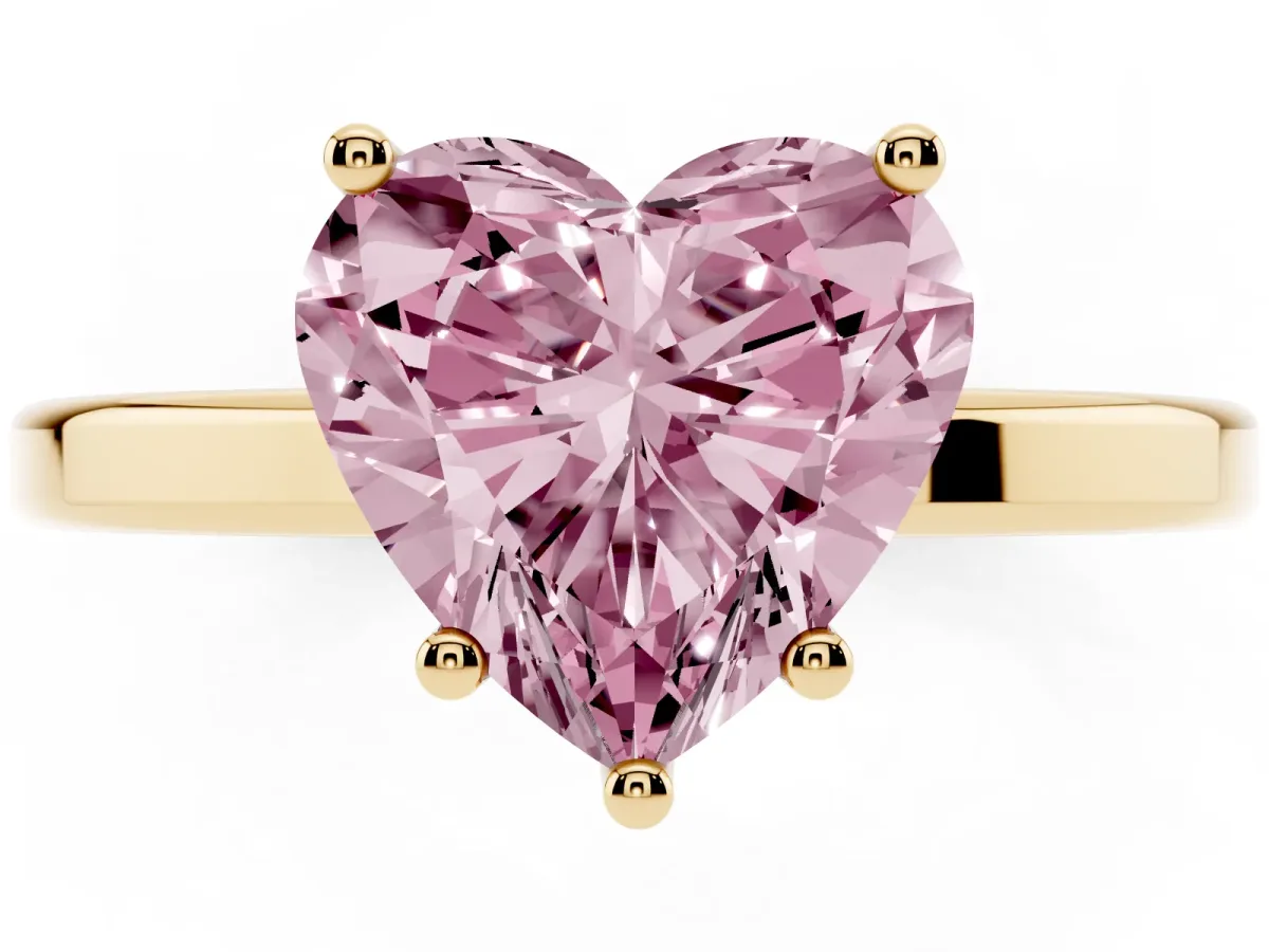 Fancy Pink Heart Cut Cut Solitaire Engagement Ring with Four-Prong Setting on a Classic Band Yellow gold