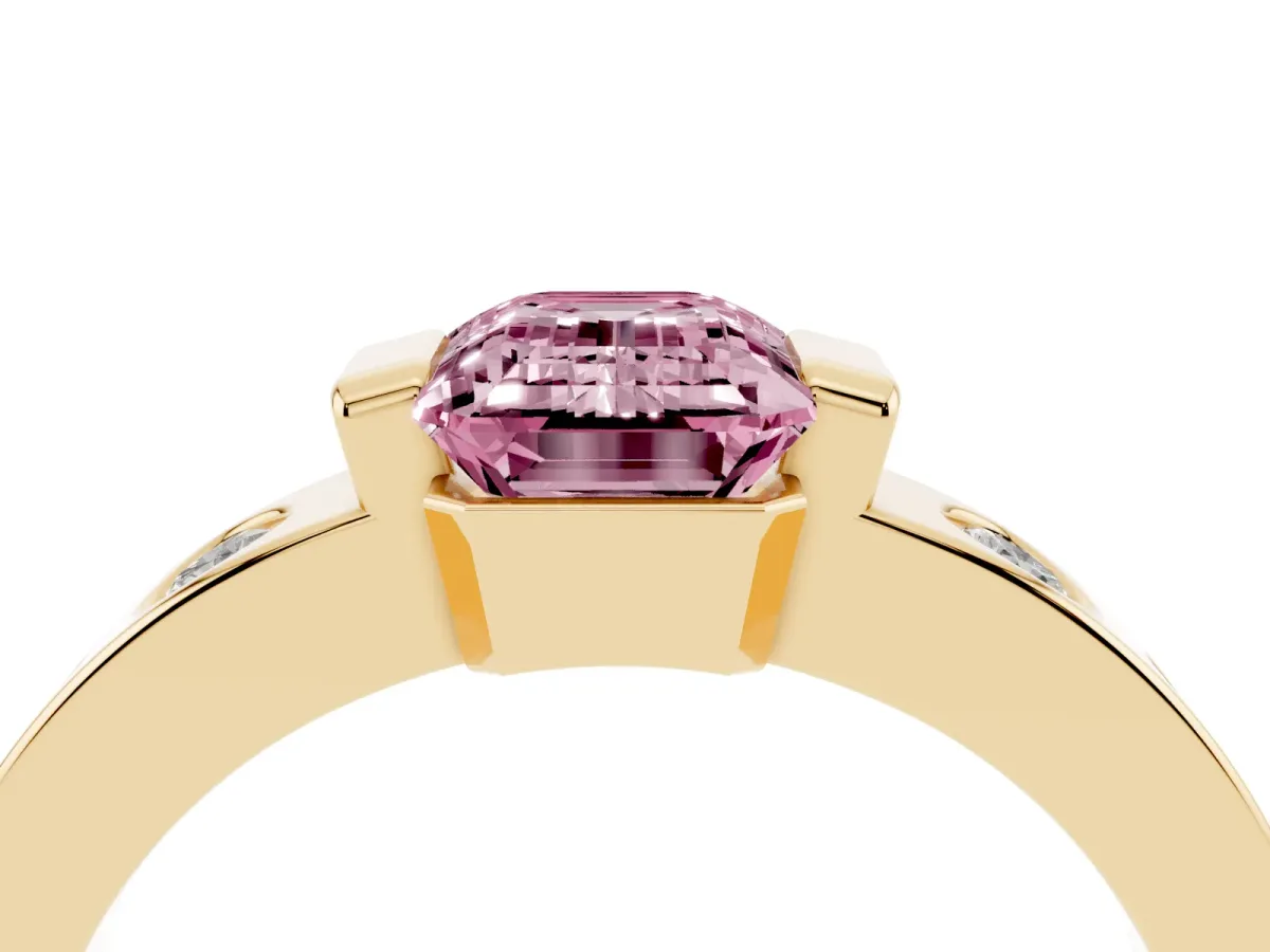 Fancy Pink Emerald Cut Brilliant Channel-Set Diamond Ring with Bezel Prong Setting Yellow gold