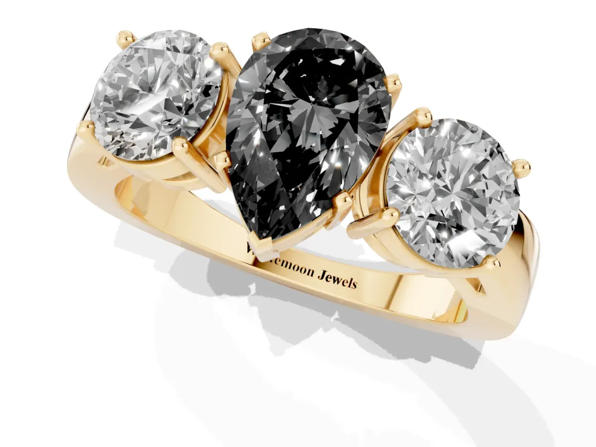 Fancy Black Three-Stone Pear Cut Diamond Ring with Round Side Stones, Classic Band, and Four-Prong Setting Yellow gold