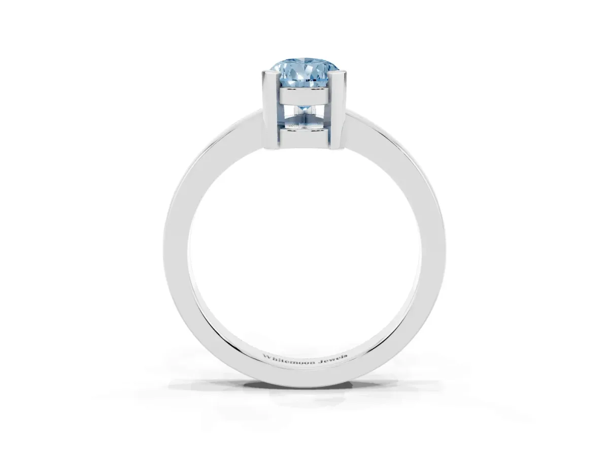 Fancy Blue Pear Cut Cut Solitaire Ring with Four-Prong Setting and Classic Band Platinum