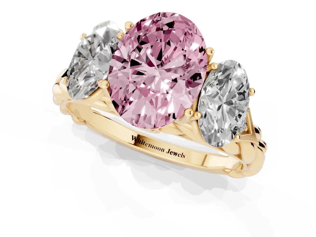 Fancy Pink Three-Stone Oval Cut Diamond Braided Band Ring with Four-Prong Setting Yellow gold