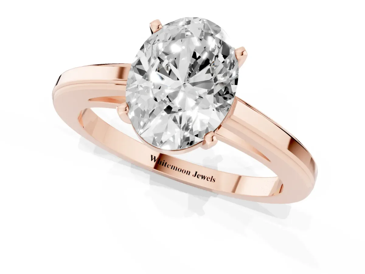 Oval Cut Solitaire Diamond Ring with Four-Prong Setting and Classic Band Rose gold