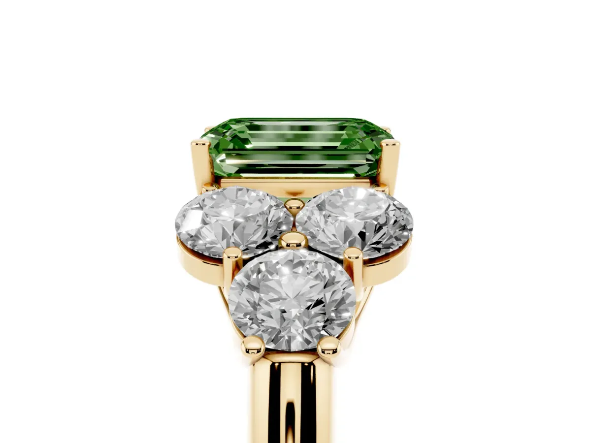 Fancy Green Emerald Cut Cut Diamond Cluster Ring with Round Accent Stones and Prong Setting on a Classic Band Yellow gold
