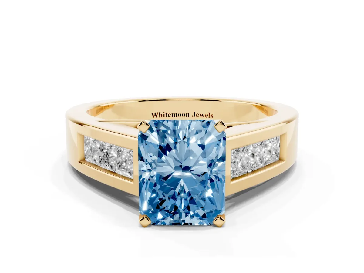 Fancy Blue Radiant Cut Cut Channel Set Solitaire Ring with Four-Prong Setting Yellow gold