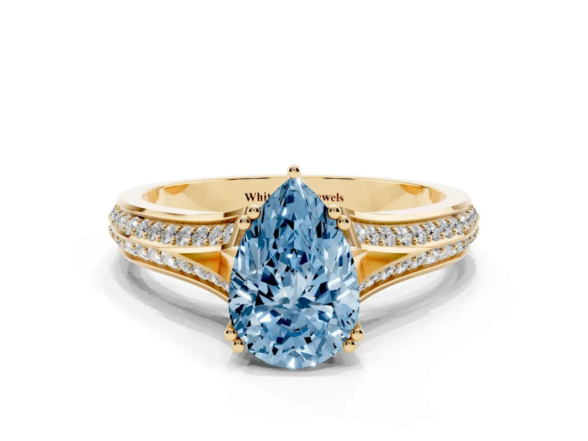 Fancy Blue Pear Cut Diamond Split Shank Engagement Ring with Pavé Band Yellow gold