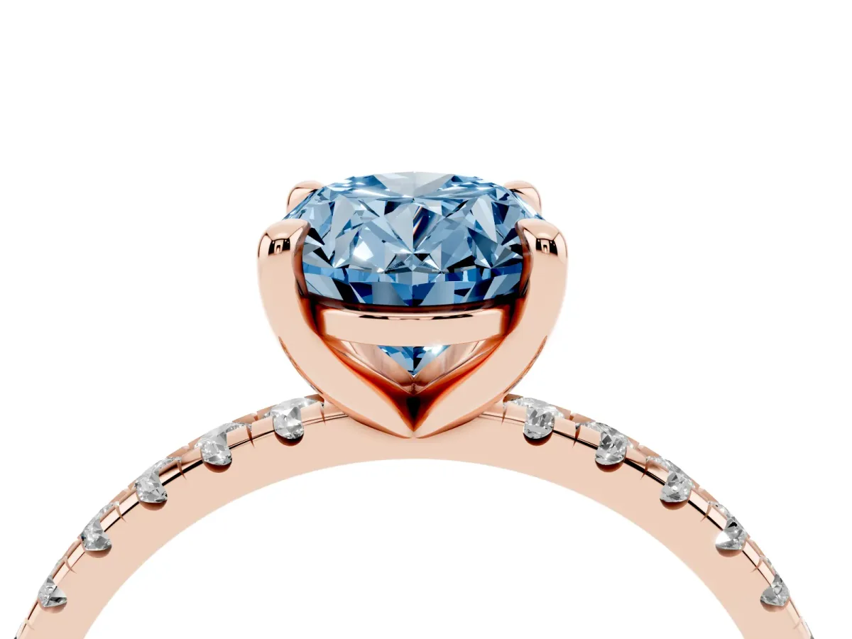 Fancy Blue Oval Cut Diamond Brilliant Solitaire Ring with Pavé Band and Four-Prong Setting Rose gold