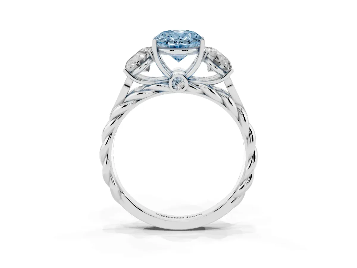 Fancy Blue Three-Stone Oval Cut Diamond Braided Band Ring with Four-Prong Setting Platinum