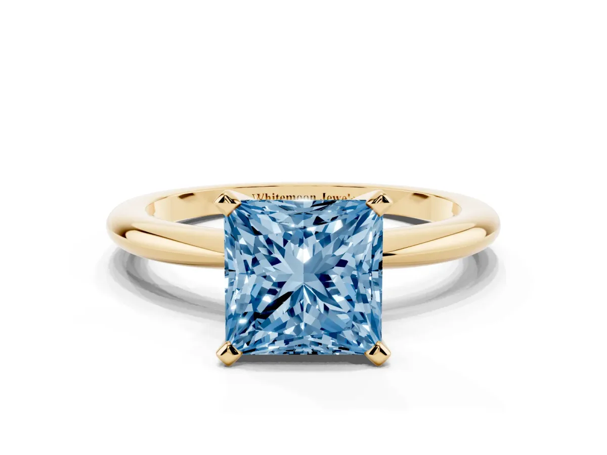 Fancy Blue Princess Cut Diamond Solitaire Ring with Prong Setting and Classic Band Yellow gold