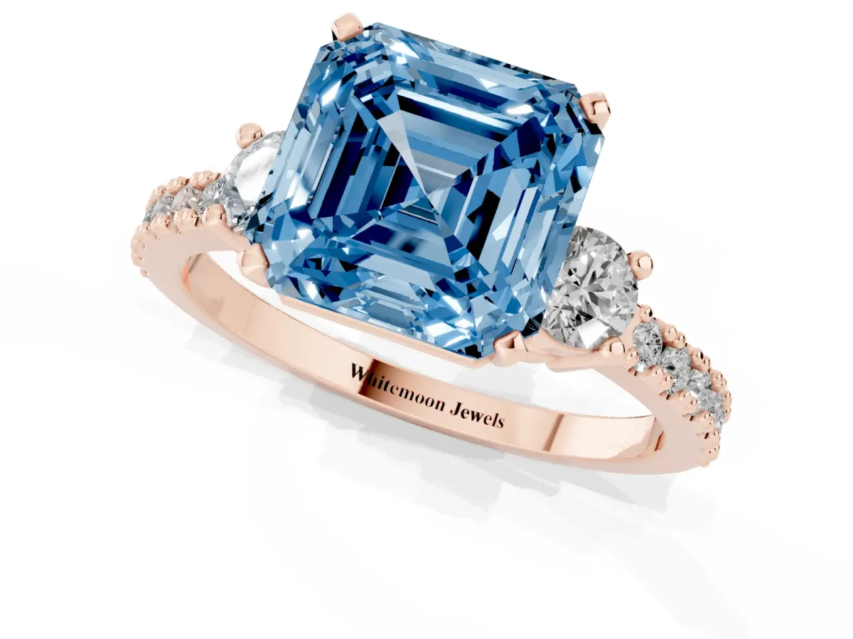 Fancy Blue Asscher Cut Three-Stone Diamond Pavé Band with Prong Setting Rose gold