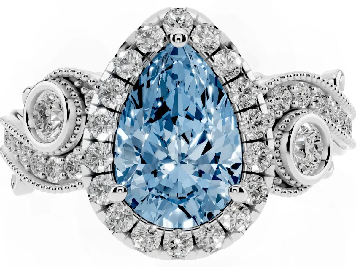 Fancy Blue Pear Cut Halo Diamond Ring with Milgrain and Bezel Accents on a Split Shank Band White gold