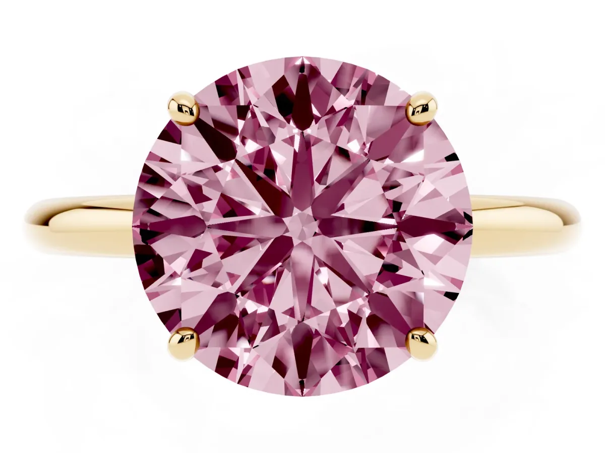 Fancy Pink Round Cut Solitaire Diamond Ring with Four-Prong Setting on a Plain Band Yellow gold