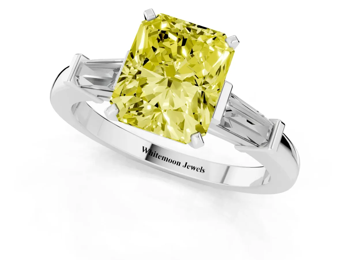 Fancy Yellow Radiant Cut Cut Diamond Solitaire Ring with Tapered Baguette Accents and Four-Prong Setting White gold
