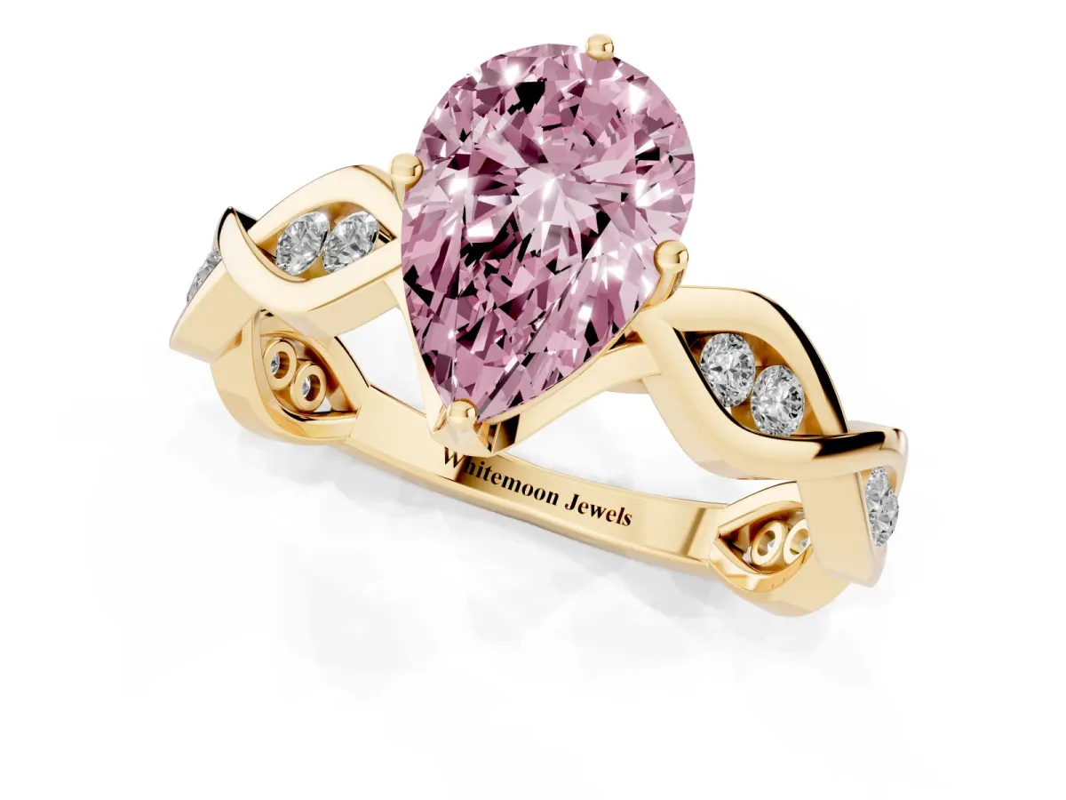 Fancy Pink Pear Cut Solitaire Twist Band with Leaf Prong Setting Yellow gold