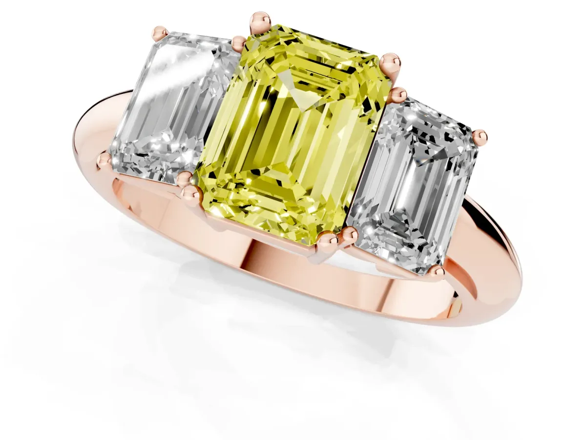 Fancy Yellow Three-Stone Emerald Cut Cut Diamond Engagement Ring with Prong Setting on a White Gold Band Rose gold