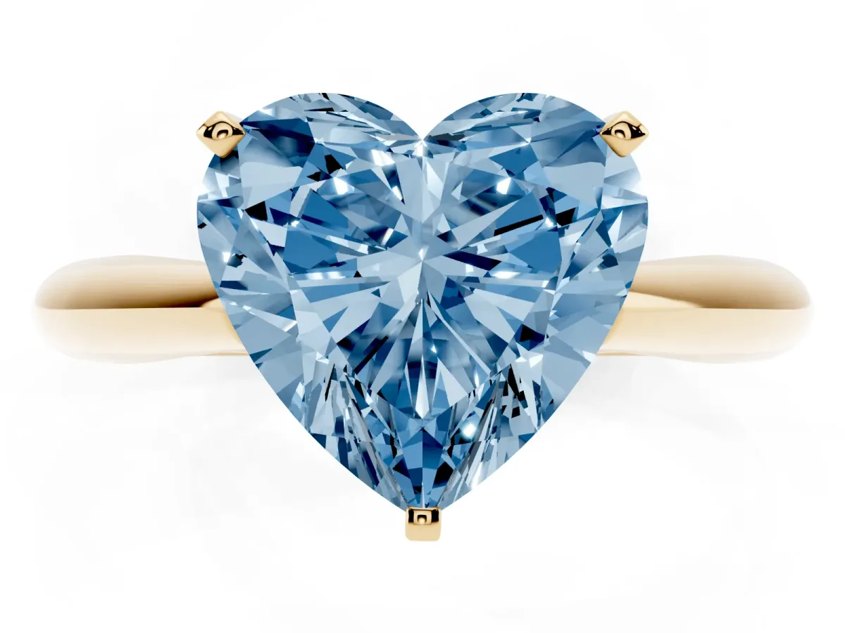 Fancy Blue Heart Cut Diamond Solitaire Engagement Ring with Cathedral Setting and Four-Prong Mount Yellow gold
