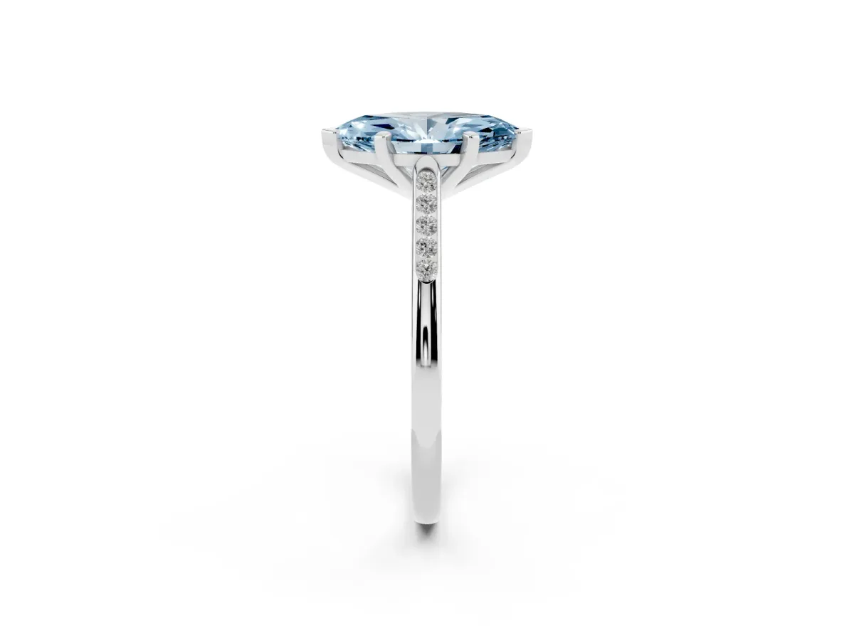 Fancy Blue Marquise Cut Diamond Solitaire Ring with Channel Set Round Band and Prong Setting Silver