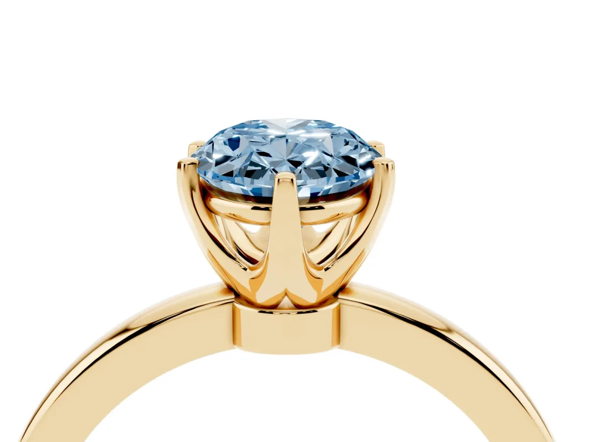 Fancy Blue Oval Cut Solitaire Diamond Ring with Six-Prong Setting on a Classic Band Yellow gold