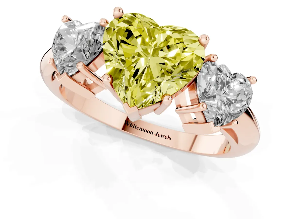 Fancy Yellow Three-Stone Heart Cut Cut Diamond Engagement Ring with Prong Setting on a White Gold Band Rose gold