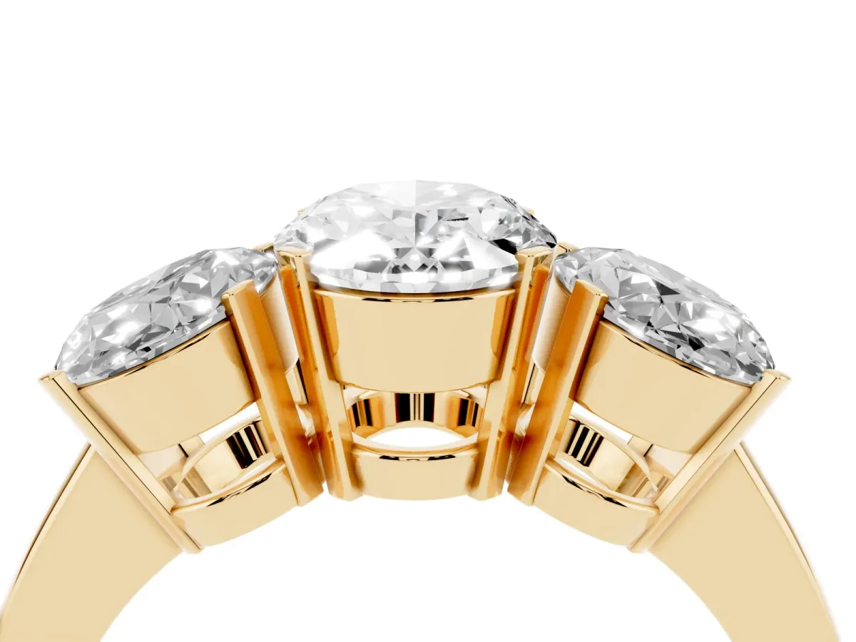 Three-Stone Oval Cut Cut Diamond Ring with Channel Set Band and Four-Prong Setting Yellow gold
