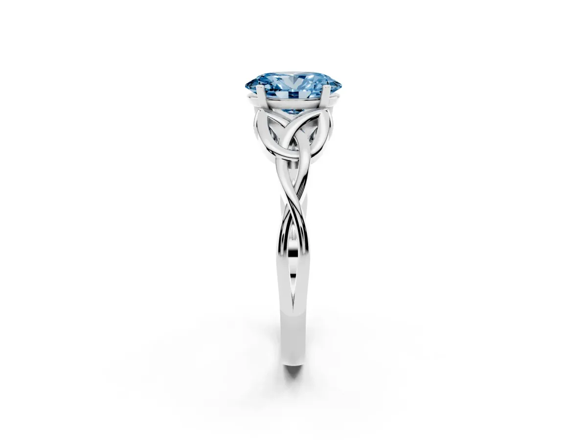 Fancy Blue Oval Cut Diamond Solitaire Engagement Ring with Celtic Knot Band and Four-Prong Setting Silver