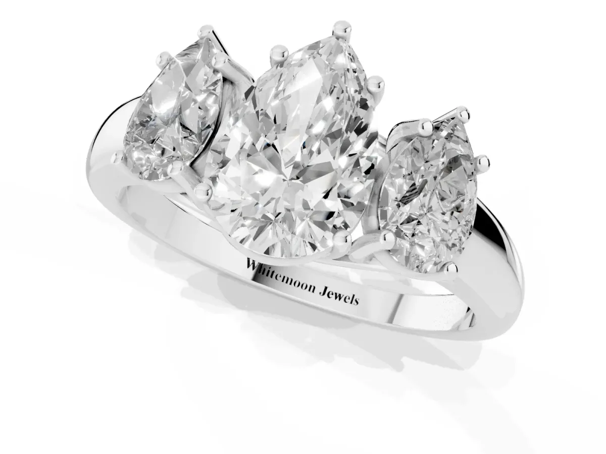 Three-Stone Pear Cut Diamond Engagement Ring with Prong Setting Silver