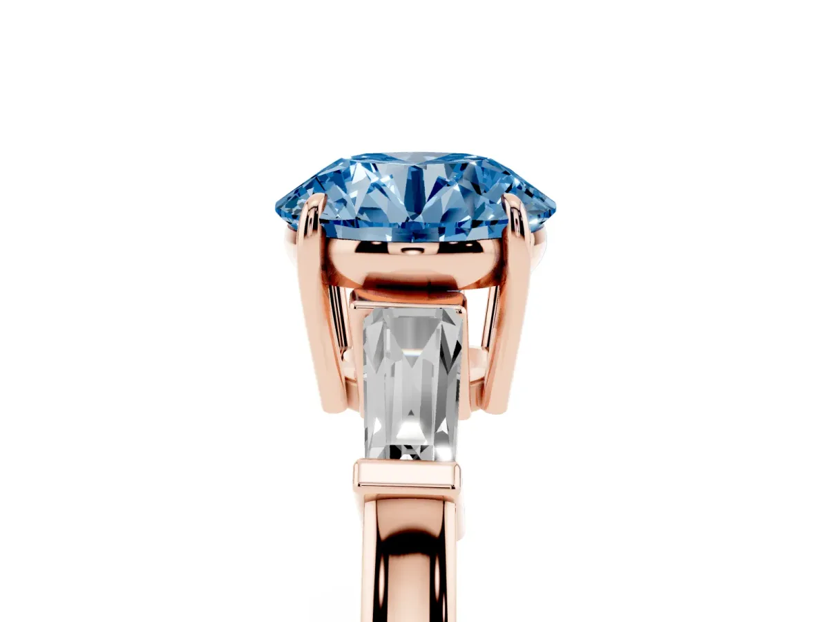 Fancy Blue Round Cut Diamond Three-Stone Ring with Tapered Baguette Side Stones and Prong Setting Rose gold