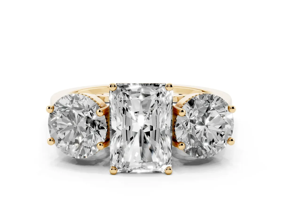 Three-Stone Radiant Cut Diamond Engagement Ring with Prong Setting on a Classic Band Yellow gold
