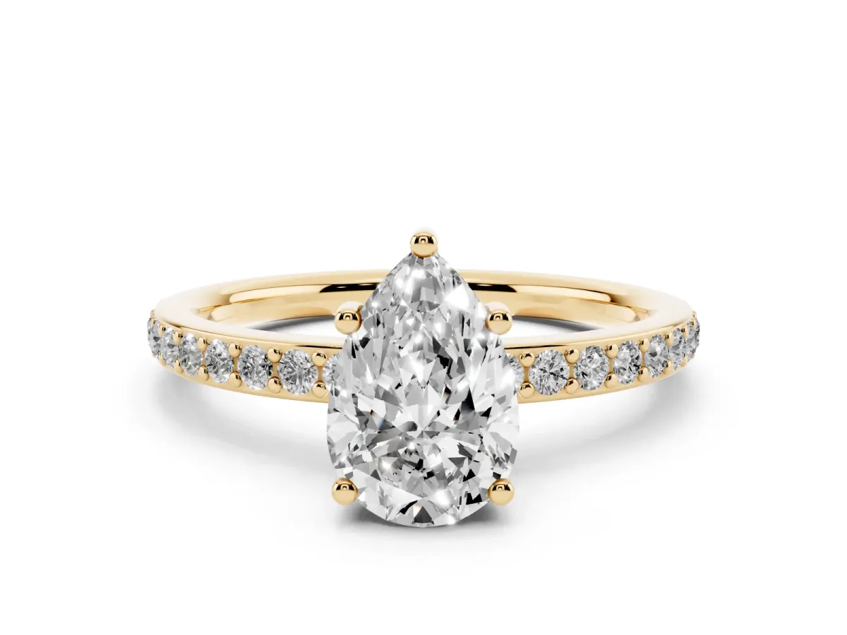 Pear Cut Cut Diamond Pavé Band Ring with Four-Prong Setting Yellow gold