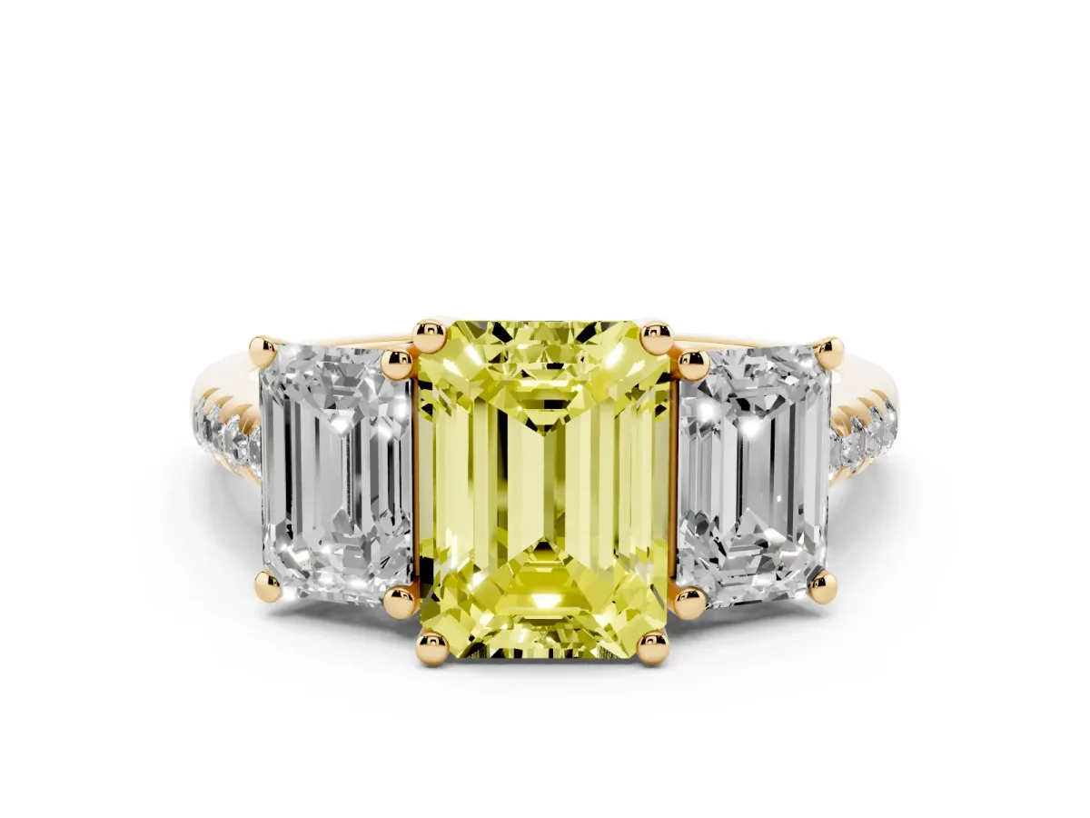 Fancy Yellow Three-Stone Emerald Cut Diamond Ring with Round Pavé Band and Prong Setting Yellow gold