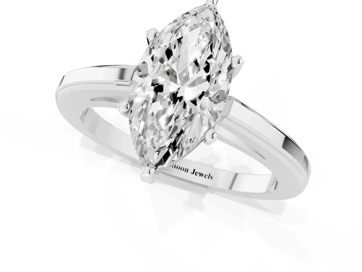 Marquise Cut Solitaire Diamond Ring with Four-Prong Setting and Classic Band Silver