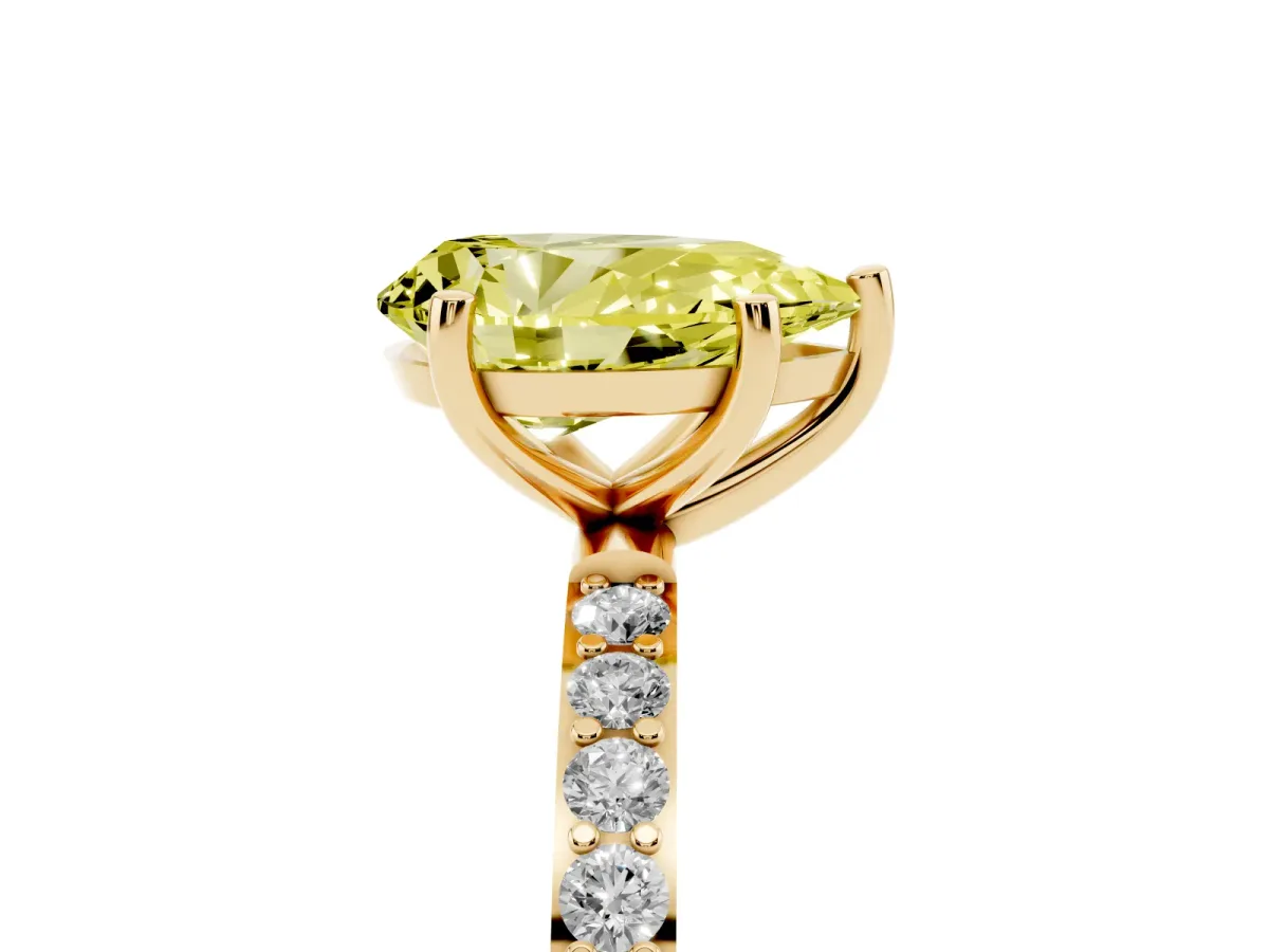 Fancy Yellow Pear Cut Diamond Solitaire Ring with Round Pavé Shoulders and Prong Setting Yellow gold