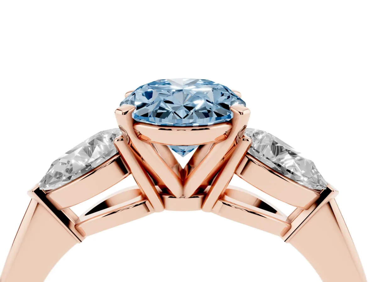 Fancy Blue Three-Stone Oval Cut Diamond Ring with Pear Side Stones and Four-Prong Setting Rose gold
