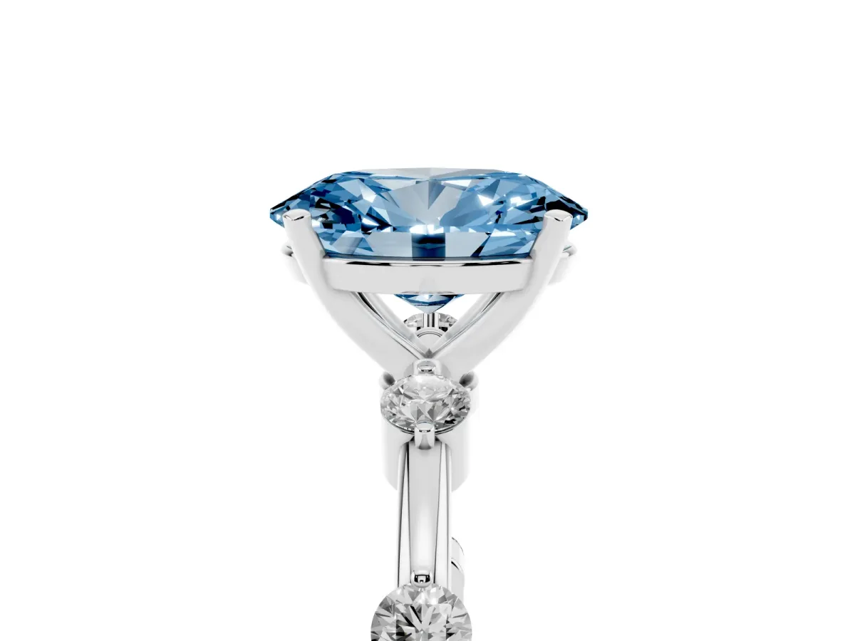 Fancy Blue Oval Cut Solitaire Diamond Ring with Bezel Set Side Stones and Prong Setting Silver