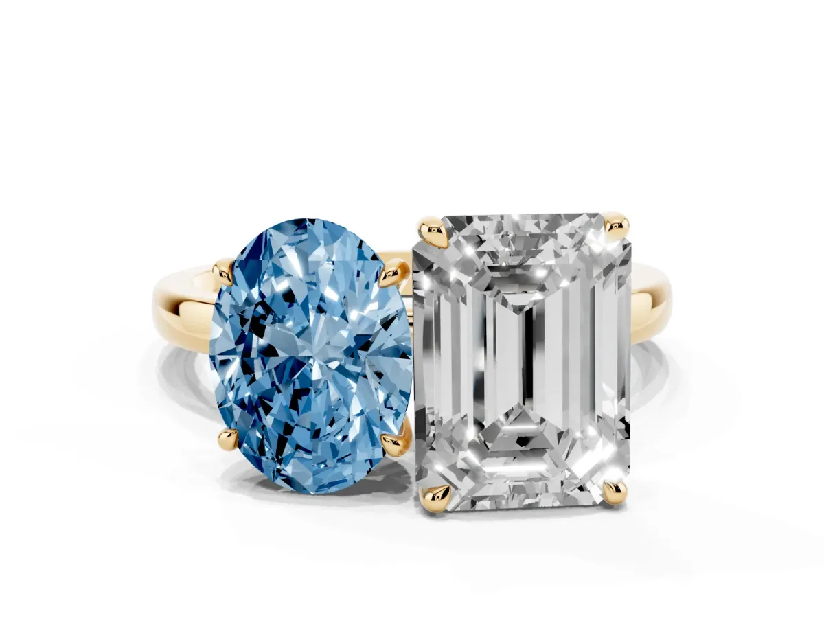 Fancy Blue Oval Cut and Emerald Cut Toi Moi Ring with Prong Setting Yellow gold